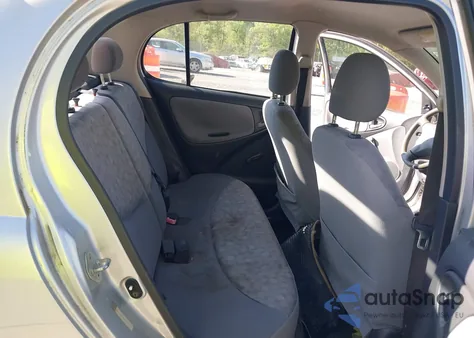 2001 Toyota Echo из США, поврежденный, VIN JTDBT123010137177